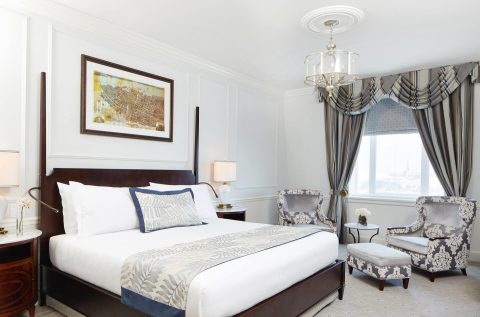 A king sized bed room and suite from The Charleston Place